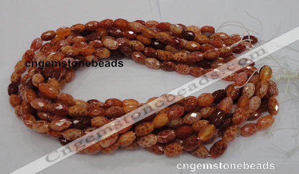 CAG599 15.5 inches 10*14mm faceted rice natural fire agate beads