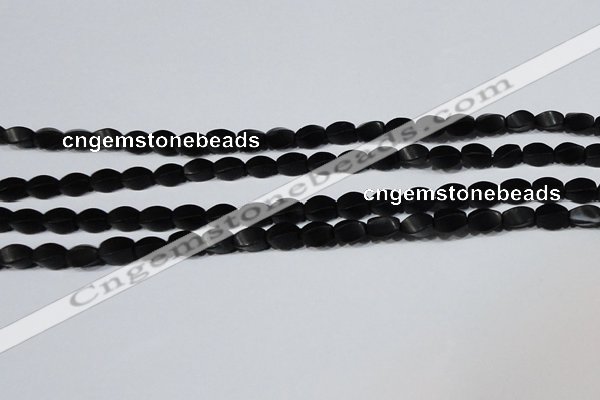 CAG6040 15.5 inches 5*8mm twisted rice matte black agate beads