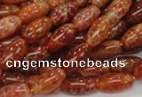 CAG605 15.5 inches 8*14mm rice natural fire agate beads wholesale