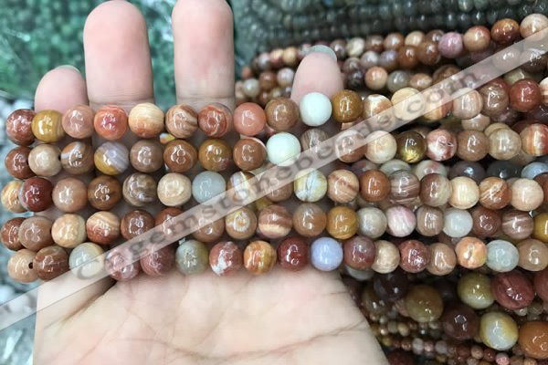 CAG9811 15.5 inches 6mm faceted round wood agate beads