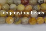 CAG9868 15.5 inches 4mm faceted round yellow crazy lace agate beads