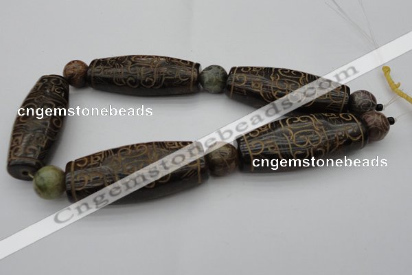 CAL03 14.5 inches 25*60mm carved drum agalmatolite beads