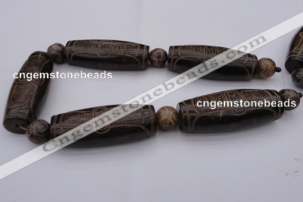 CAL04 14.5 inches 25*60mm carved drum agalmatolite beads