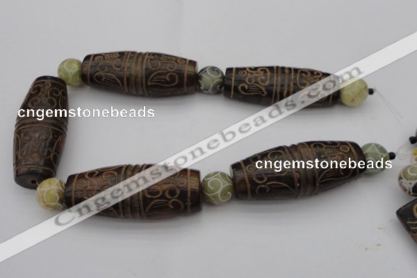 CAL05 14.5 inches 25*60mm carved drum agalmatolite beads