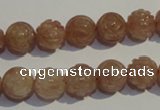 CBQ14 15.5 inches 10mm carved round strawberry quartz beads