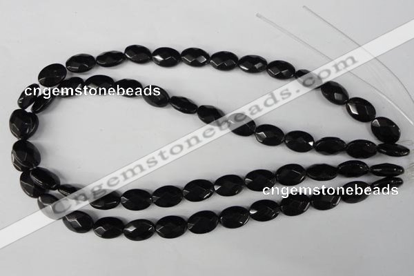 CBS310 15.5 inches 10*14mm faceted oval blackstone beads wholesale