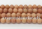 CCA517 15.5 inches 12mm round peach calcite gemstone beads