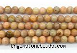 CCA553 15.5 inches 10mm round peach calcite gemstone beads