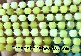 CCU1426 15 inches 6mm - 7mm faceted cube lemon jade beads