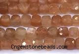 CCU885 15 inches 4mm faceted cube sunstone beads