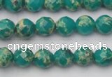 CDE2170 15.5 inches 6mm faceted round dyed sea sediment jasper beads