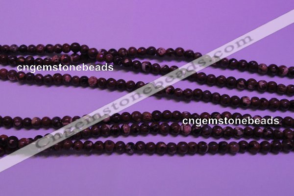 CDM50 15 inches 4mm round strawberry dalmatian jasper beads