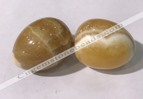 CDN1380 35*45mm egg-shaped yellow calcite decorations wholesale