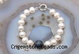 CFB1071 Hand-knotted 9mm - 10mm potato white freshwater pearl & blue tiger eye bracelet