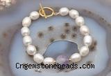 CFB904 Hand-knotted 9mm - 10mm rice white freshwater pearl & lavender amethyst bracelet