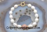 CFB912 Hand-knotted 9mm - 10mm rice white freshwater pearl & moonstone bracelet