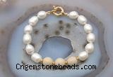 CFB946 Hand-knotted 9mm - 10mm rice white freshwater pearl & white fossil jasper bracelet