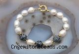 CFB956 Hand-knotted 9mm - 10mm rice white freshwater pearl & snowflake obsidian bracelet