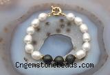 CFB958 Hand-knotted 9mm - 10mm rice white freshwater pearl & golden obsidian bracelet