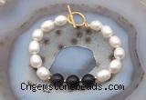 CFB975 Hand-knotted 9mm - 10mm rice white freshwater pearl & black agate bracelet