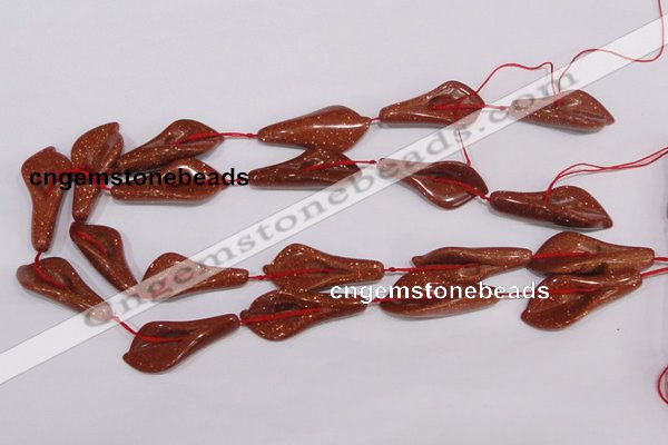 CFG04 15.5 inches 18*38mm carved trumpet flower goldstone beads