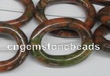 CFG271 15.5 inches 24*30mm carved oval unakite gemstone beads