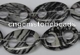 CFG301 15.5 inches 18*25mm carved oval black water jasper beads