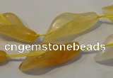 CFG561 15.5 inches 14*28mm carved trumpet flower yellow aventurine beads