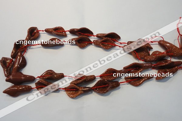 CFG568 15.5 inches 14*28mm carved trumpet flower goldstone beads