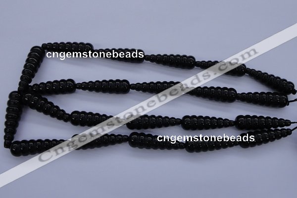 CFG761 15.5 inches 10*35mm carved teardrop black agate beads