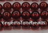 CGA608 15.5 inches 7mm AA grade round natural orange garnet beads