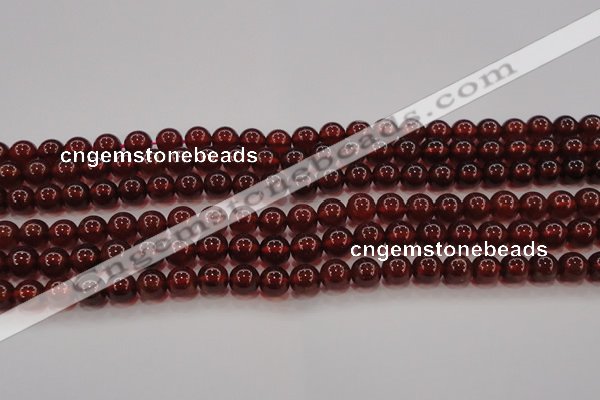 CGA608 15.5 inches 7mm AA grade round natural orange garnet beads