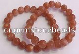 CGB4539 7.5 inches 9mm round golden sunstone beaded bracelets