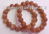 CGB4541 7.5 inches 12mm - 13mm round golden sunstone beaded bracelets