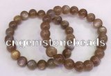 CGB4549 7.5 inches 9mm - 10mm round sunstone beaded bracelets