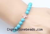 CGB9352 8mm, 10mm blue howlite & cross hematite power beads bracelets