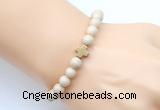 CGB9360 8mm, 10mm white fossil jasper & cross hematite power beads bracelets