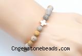 CGB9434 8mm, 10mm matte fossil coral & cross hematite power beads bracelets