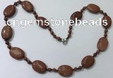 CGN201 22 inches 6mm round & 18*25mm oval goldstone necklaces