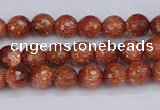 CGS470 15.5 inches 4mm faceted round goldstone beads wholesale