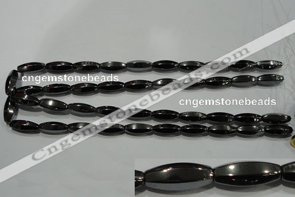 CHE141 15.5 inches 8*20mm faceted rice hematite beads wholesale