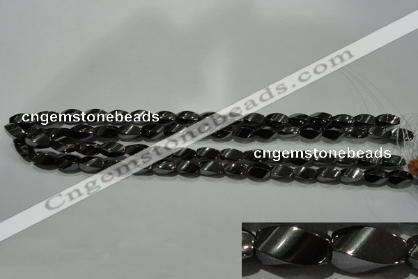 CHE161 15.5 inches 6*12mm twisted rice hematite beads