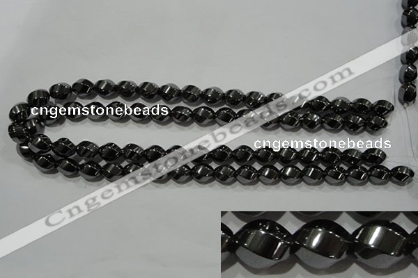 CHE166 15.5 inches 10*12mm twisted rice hematite beads