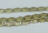 CLQ10 15.5 inches 6*10mm faceted rice natural lemon quartz beads