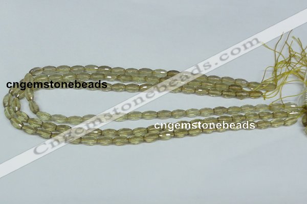 CLQ10 15.5 inches 6*10mm faceted rice natural lemon quartz beads