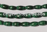 CMN210 15.5 inches 5*9mm rice natural malachite beads wholesale