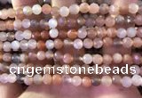 CMS1890 15.5 inches 5.5mm faceted round rainbow moonstone beads