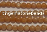 CMS701 15.5 inches 6mm round peach moonstone beads wholesale