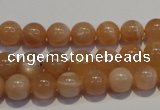 CMS702 15.5 inches 8mm round peach moonstone beads wholesale