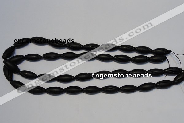 CNE15 15.5 inches 9*20mm carved rice black stone needle beads wholesale